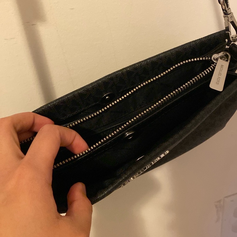 Black Michael Kors sling bag